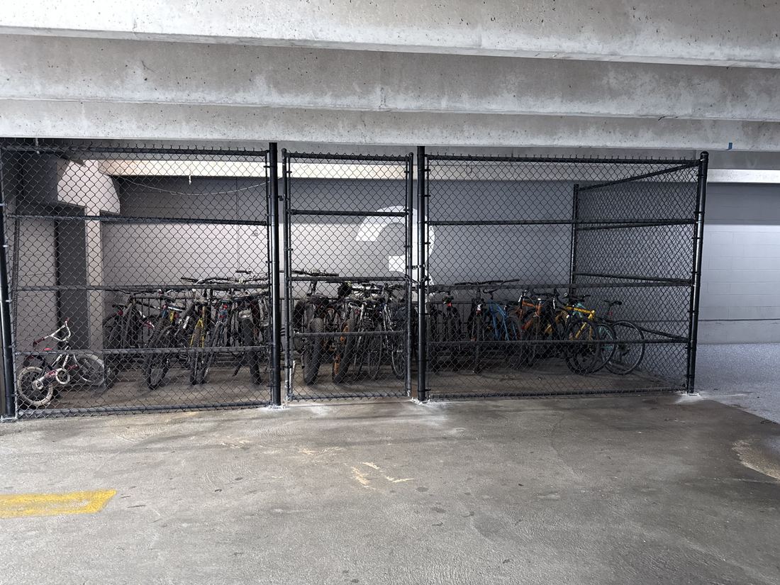 8 ft black vinyl-coated chain link enclosure