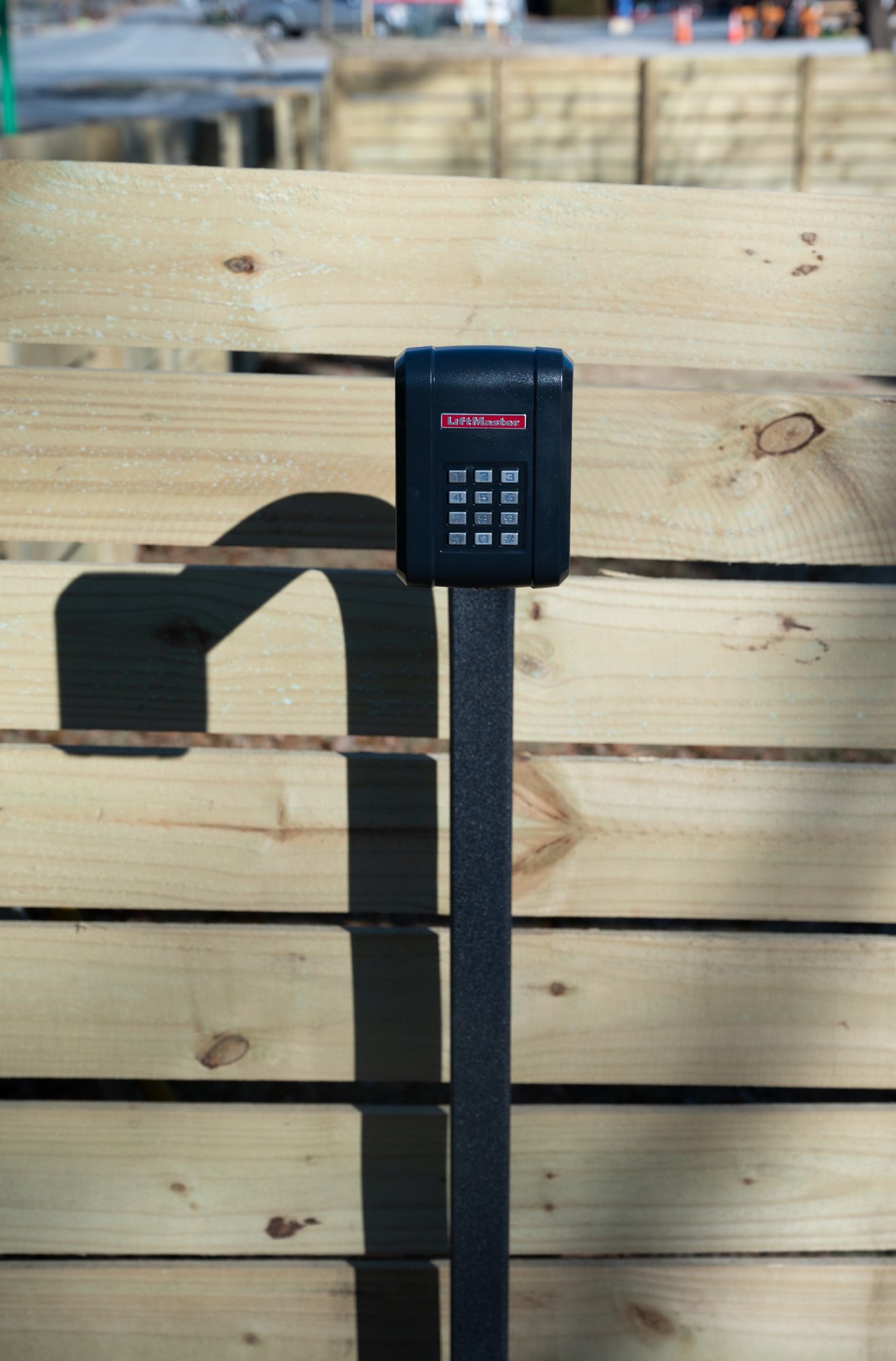 Automated gate keypad with gooseneck stand