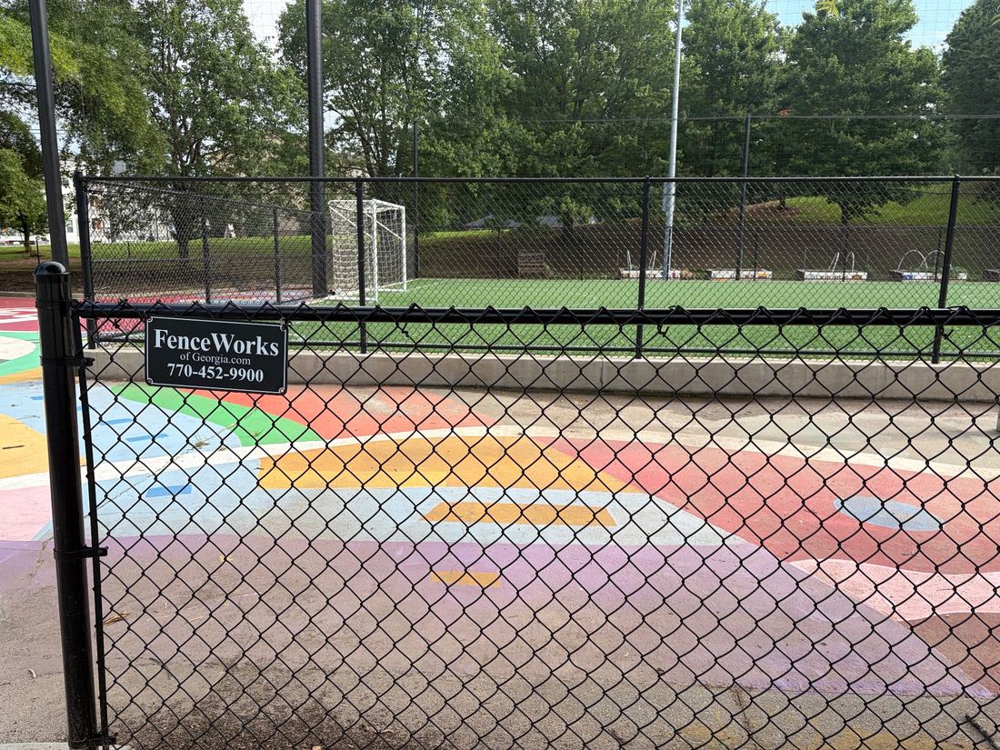 Black chain link soccer field fence