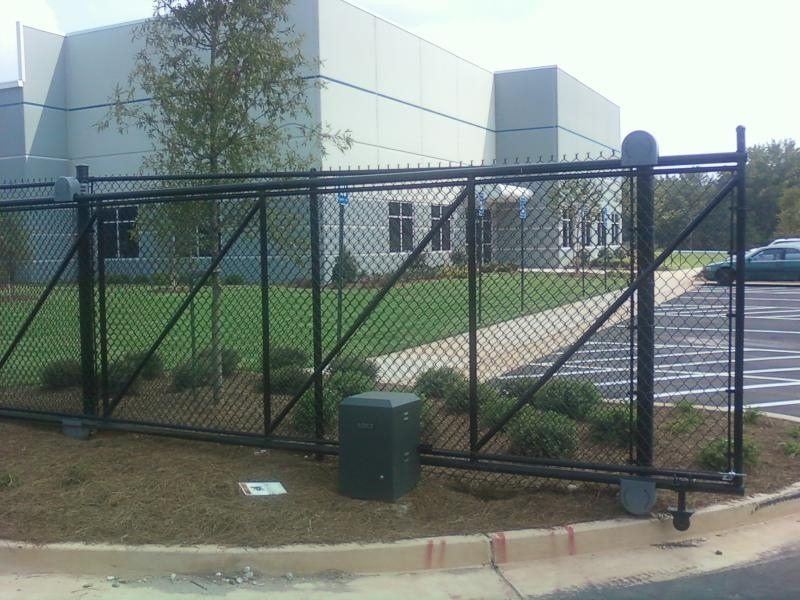 Commercial black chain link cantilever slide gate