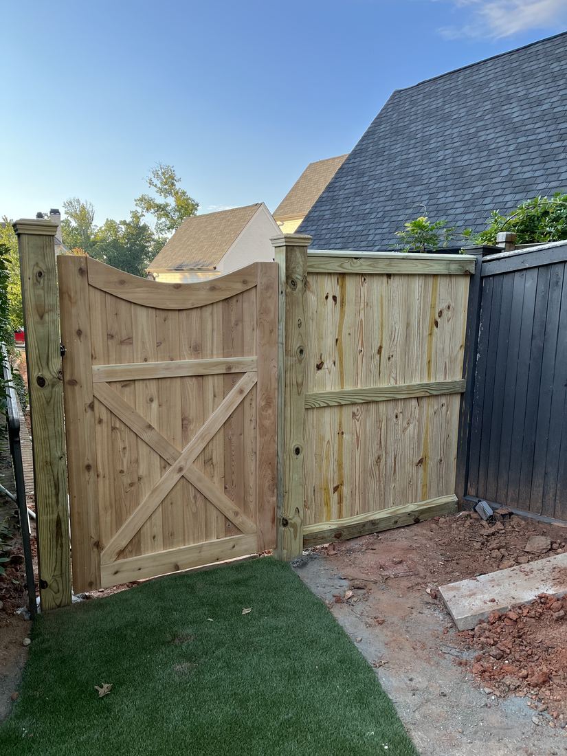 Custom wood gate and privacy fence detail in Chamblee