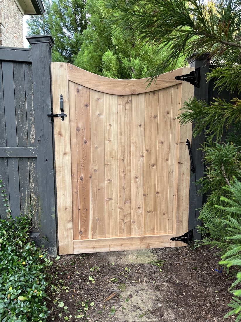 Custom wood walk gate matched to a privacy fence