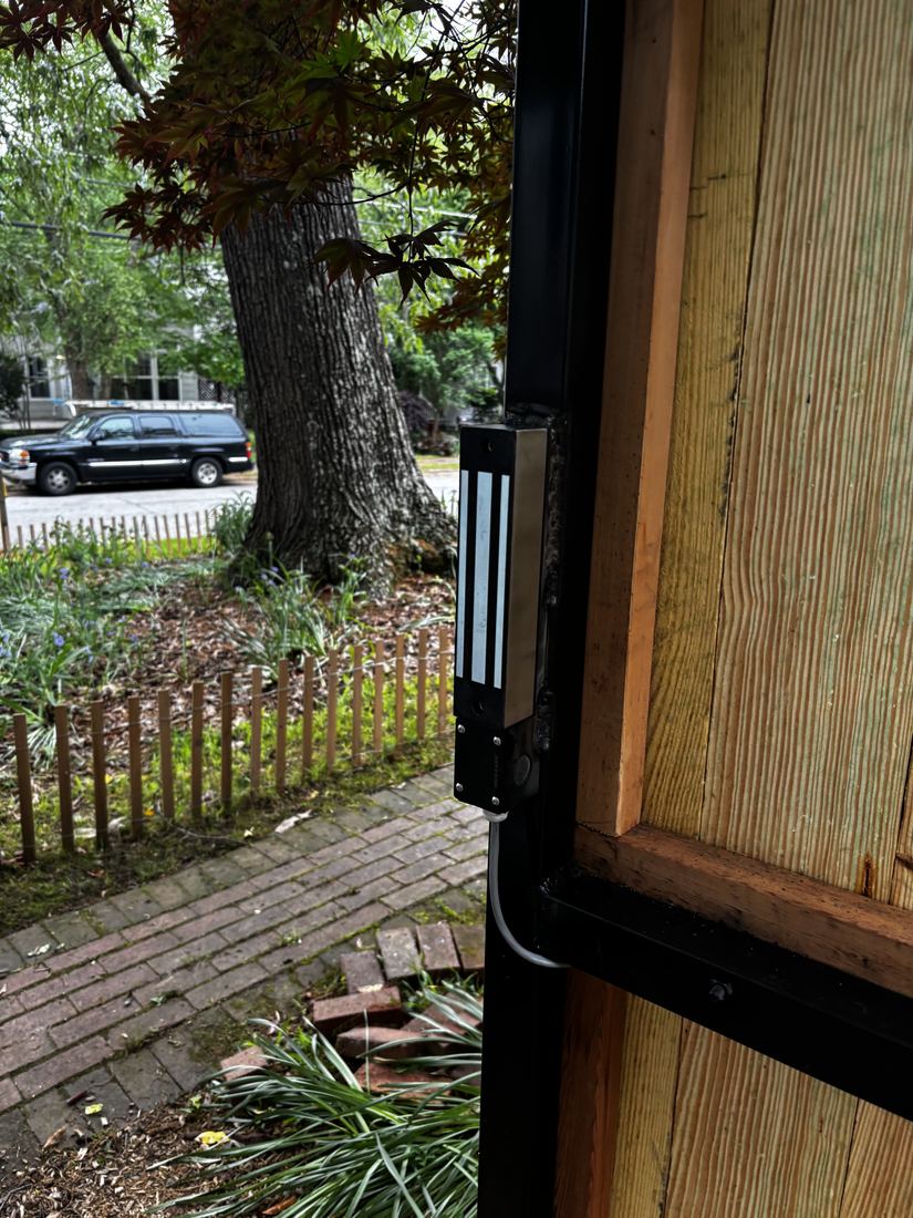 Magnetic lock automated wood gate
