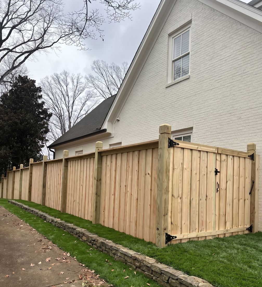 Board-on-board capped wood privacy double gate with 6x6 dado posts