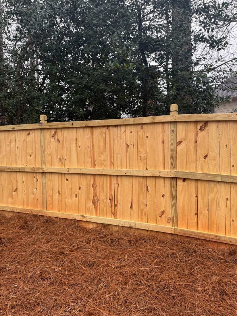 Wood capped privacy back side