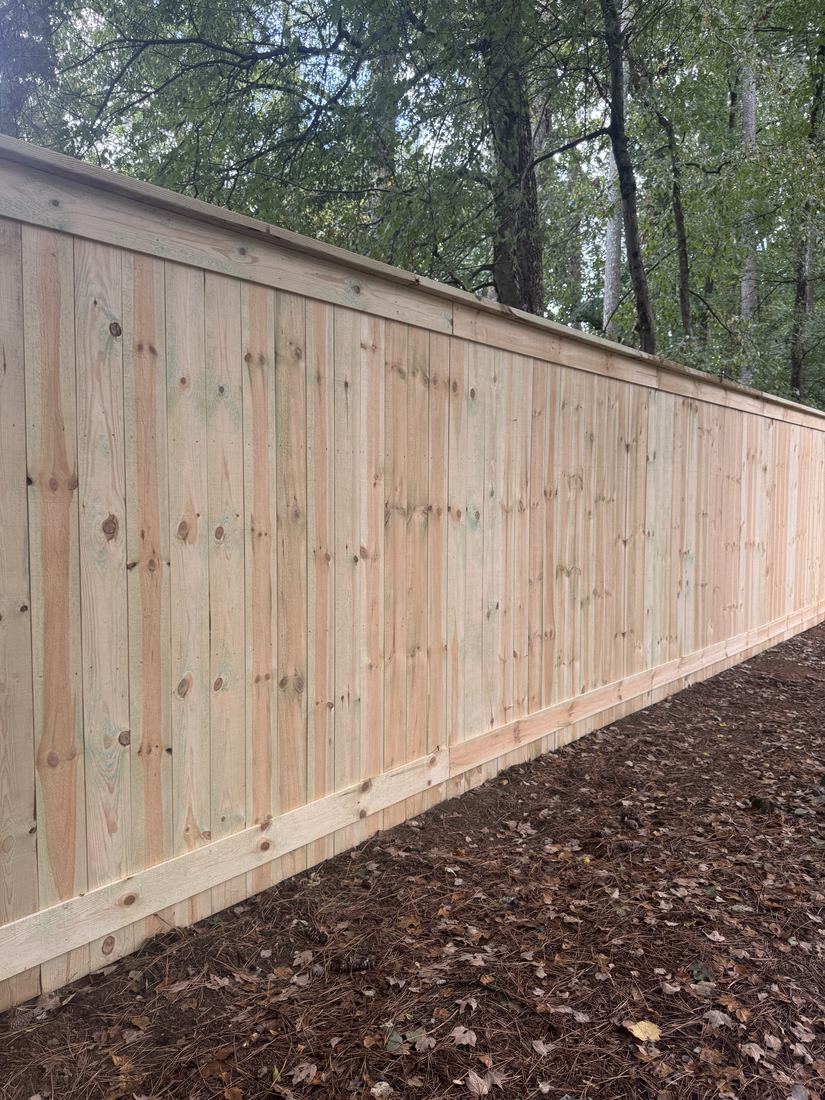 Wood capped privacy hidden posts with kickboard