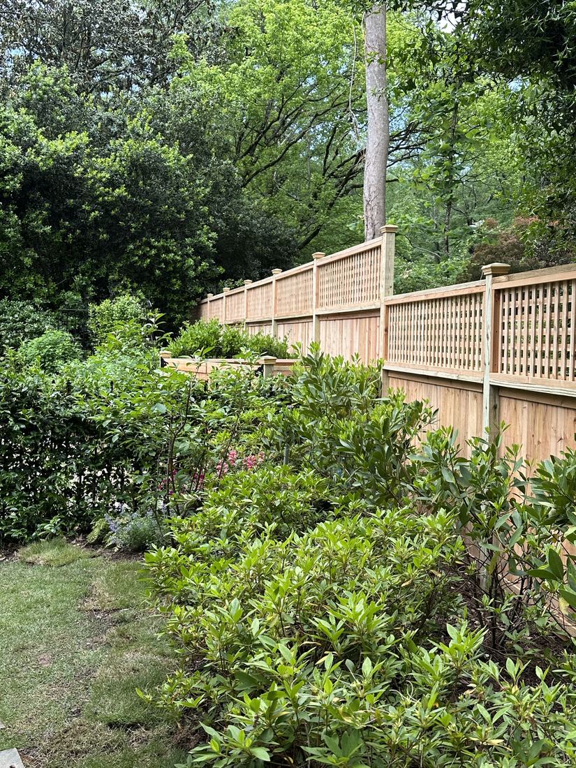 Wood capped privacy with lattice top and post caps