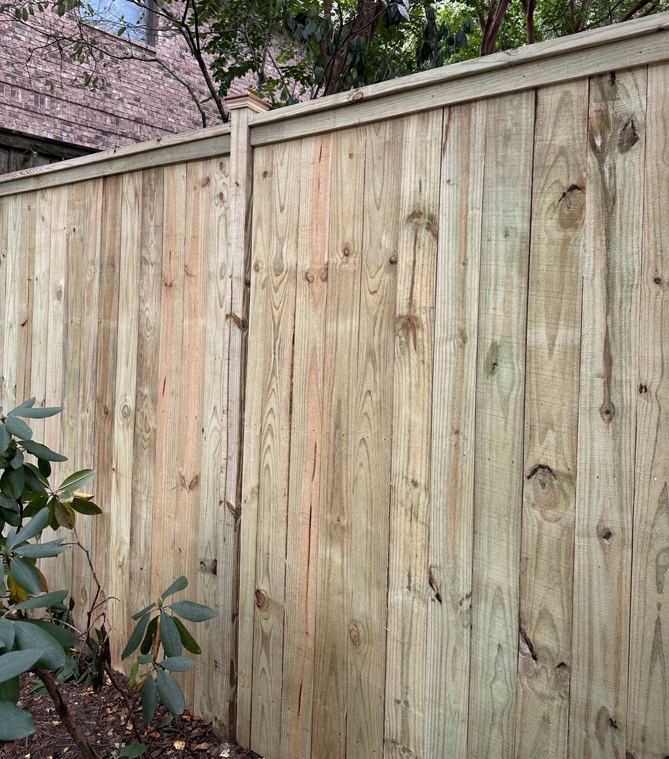 Wood capped privacy with post caps double sided