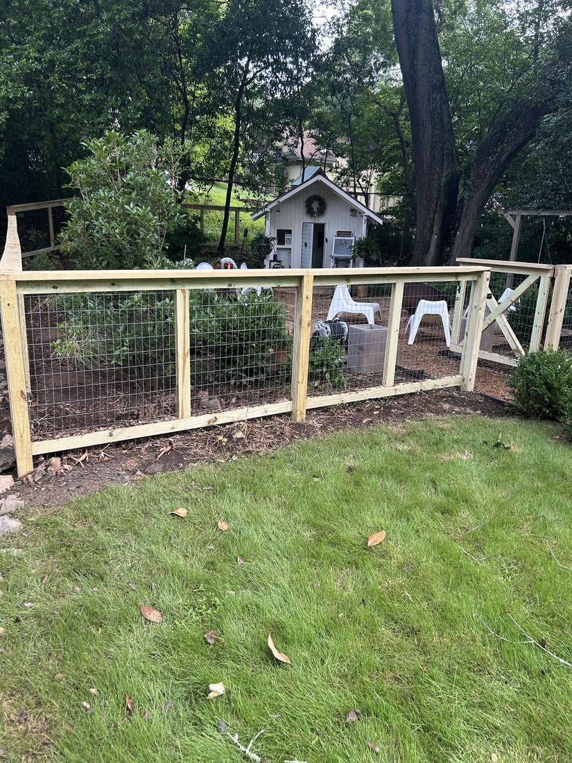 Wood capped wire fence