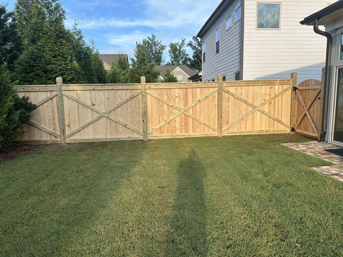 Wood crossbuck privacy fence dado posts