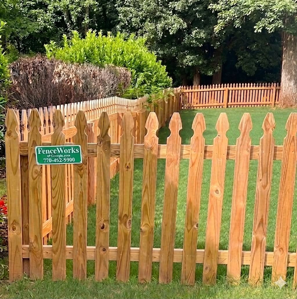 Wood virginian picket fence with 2 inch spacing and flat posts